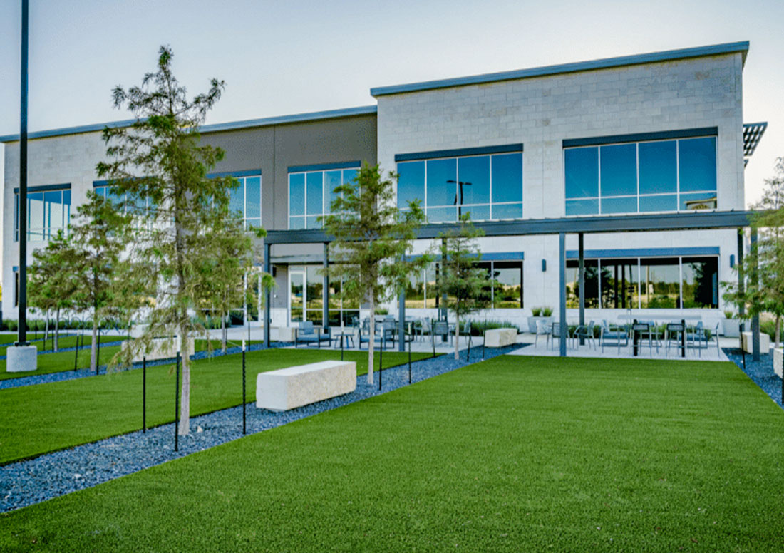 Commercial outdoor gathering space with artificial turf
