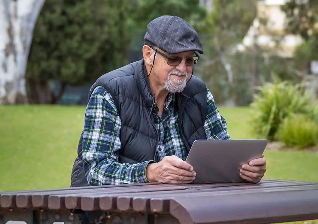 Older Senior enjoying outdoors on Artificial Turf